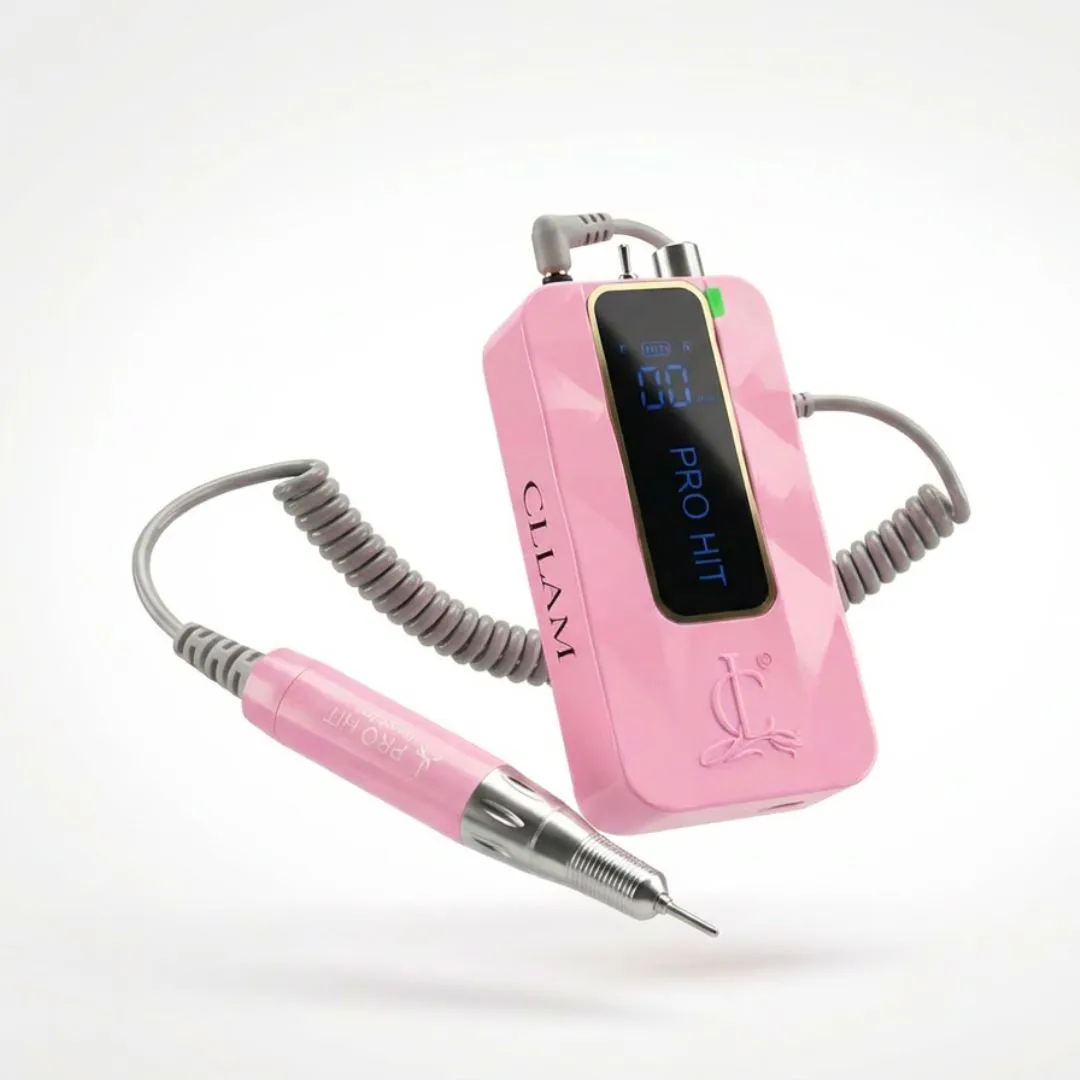 A pink pro hit nail drill with a handpiece attached